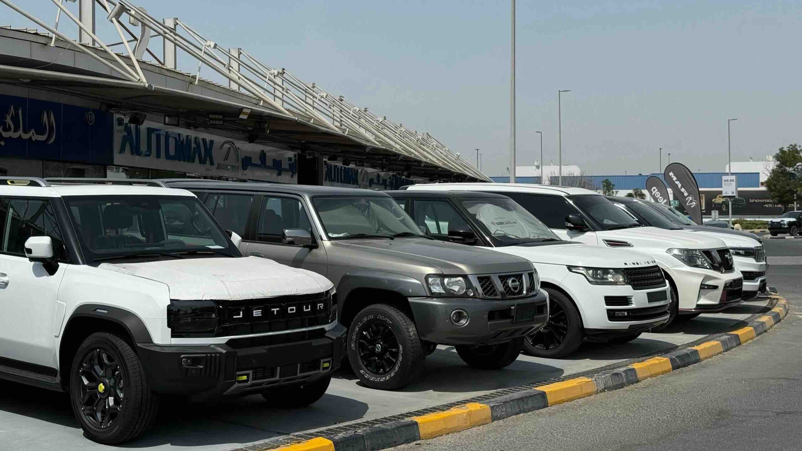 Lineup of SUVs and 4x4 vehicles displayed at Al Aweer Auto Market, a popular place to find the best used cars in Dubai.